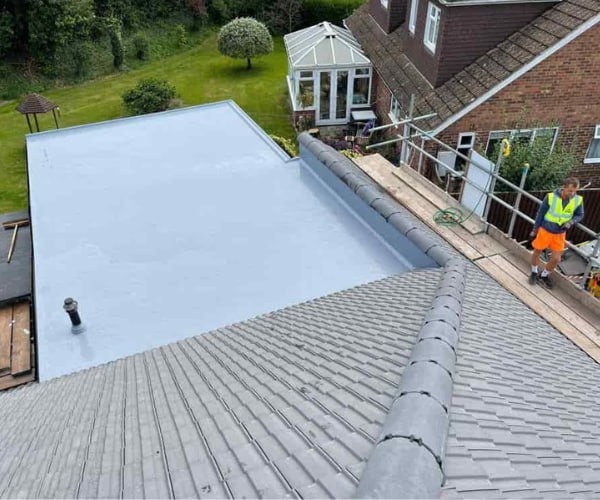 This is a photo of a newly installed hip roof, with a combined liquid covered flat roof. Work carried out by LNM Roofing Featherstone