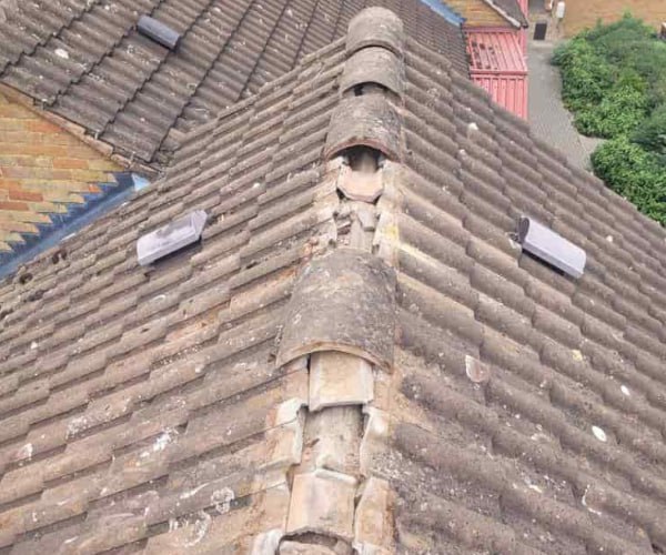 This is a photo if a roof ridge which has missing tiles. The ridge tiles are being replaced by LNM Roofing Featherstone